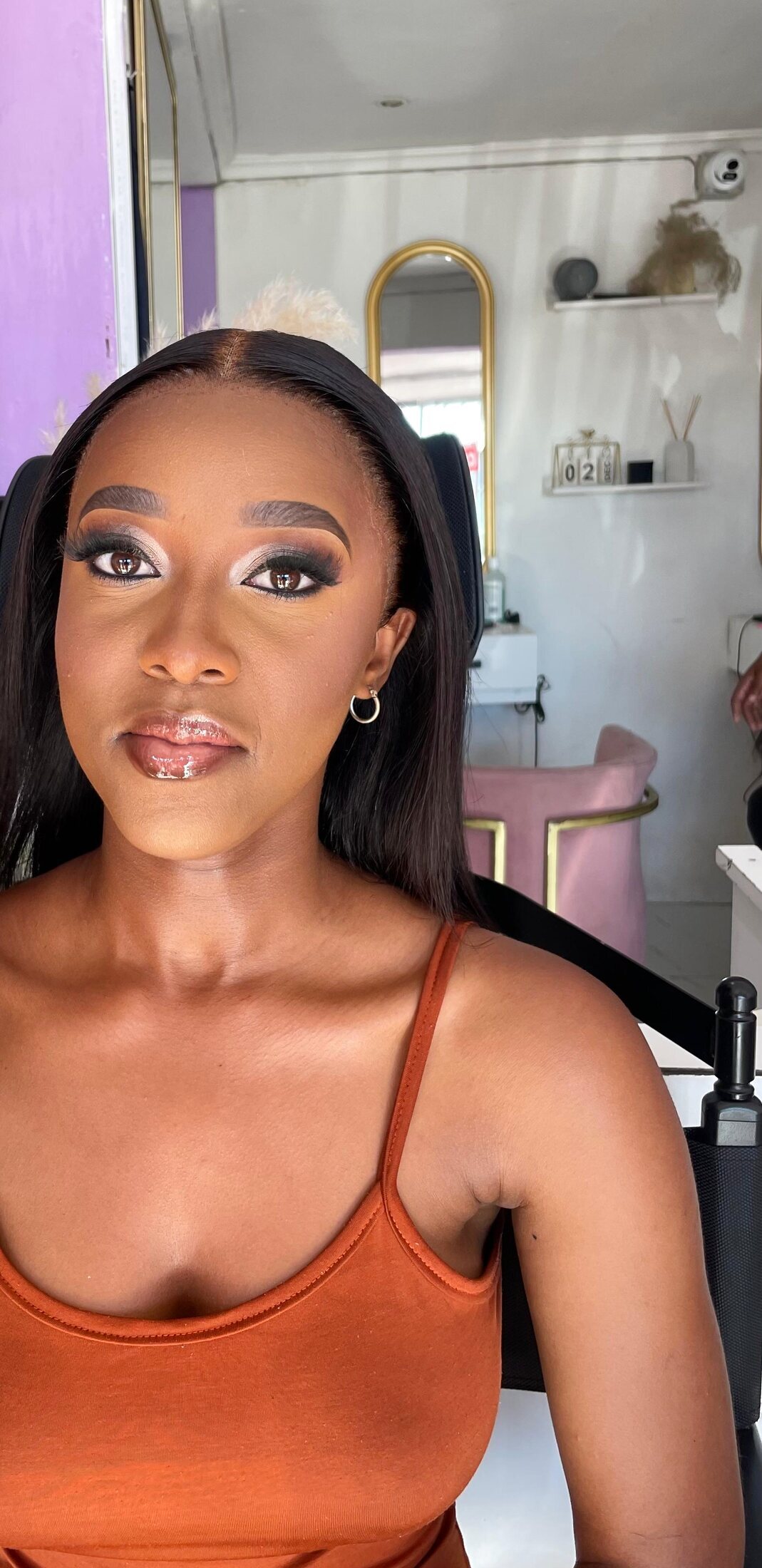 Close-up full glam portrait, sharp smoky eye and glossy lip
