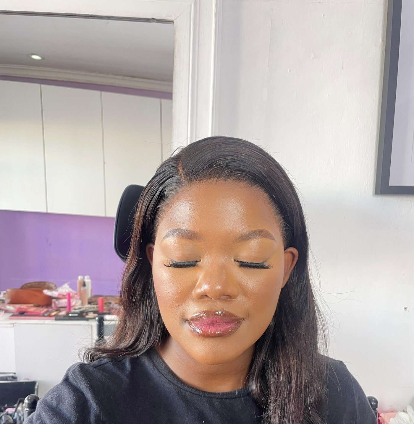 Natural glam close-up, eyes closed, soft glossy lip