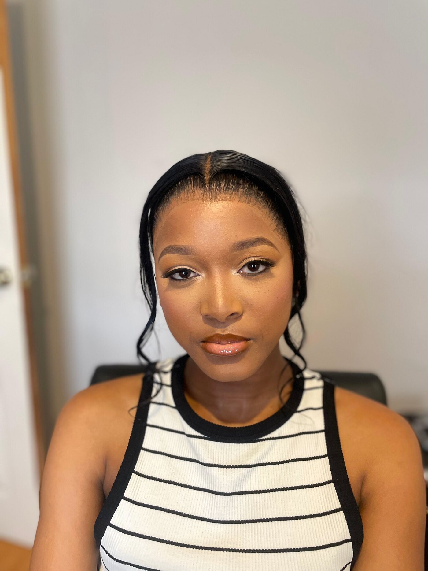 Natural glam portrait, direct gaze, softly defined eyes