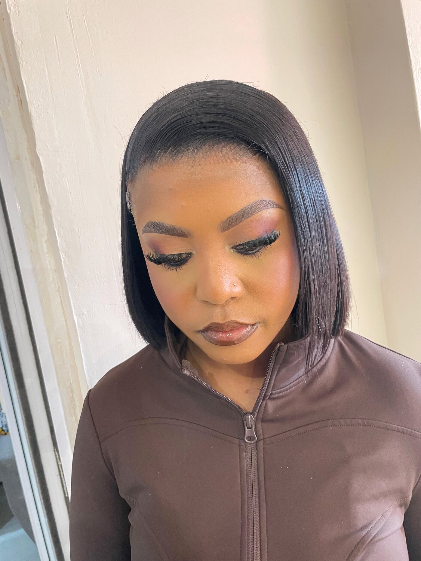 Soft glam side profile, sleek bob, clean finish